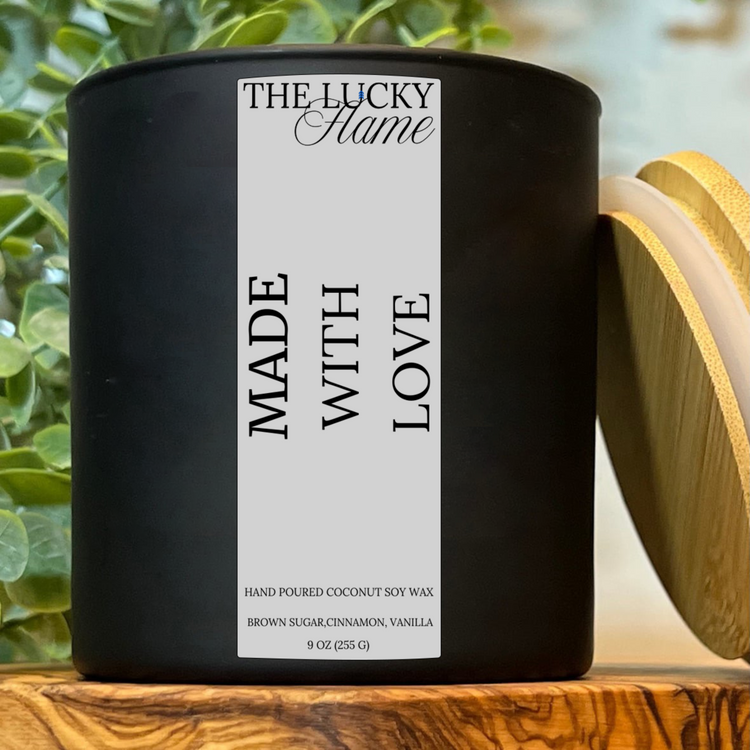 Made with Love Candle – 9 oz black jar with bamboo lid, fall scent of sweet potato soufflé with honey, cinnamon, vanilla, and brown sugar.