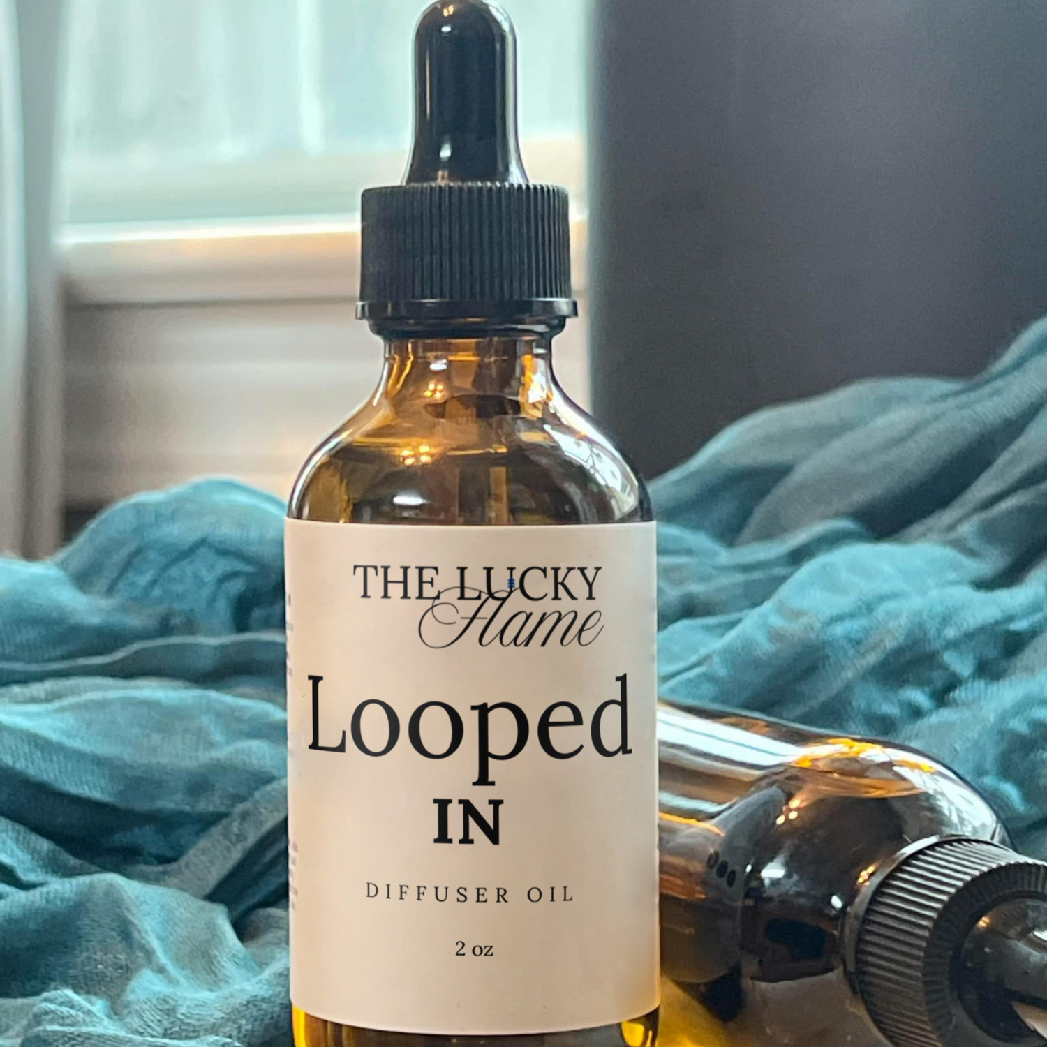 looped In diffuser oil bottle with nostalgic cereal-inspired scent and citrus notes