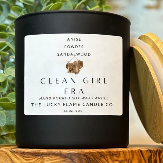 An exquisite Clean Girl Era candle, gracefully infused with the harmonious blend of aromatic anise, delicate powder, and earthy sandalwood. This eco-friendly masterpiece offers a serene sanctuary of scent, encapsulating luxury, tranquility, and the spirit of mindful elegance.